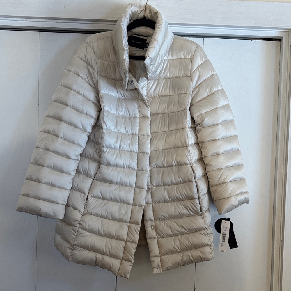 Tahari winter white shimmer puffer covers the booty.  super cute for winter